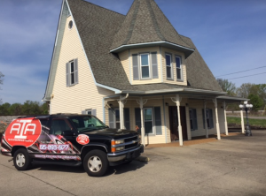 a car parked in front of a house