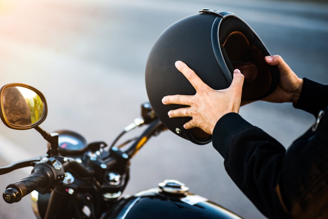 a person riding on the back of a motorcycle